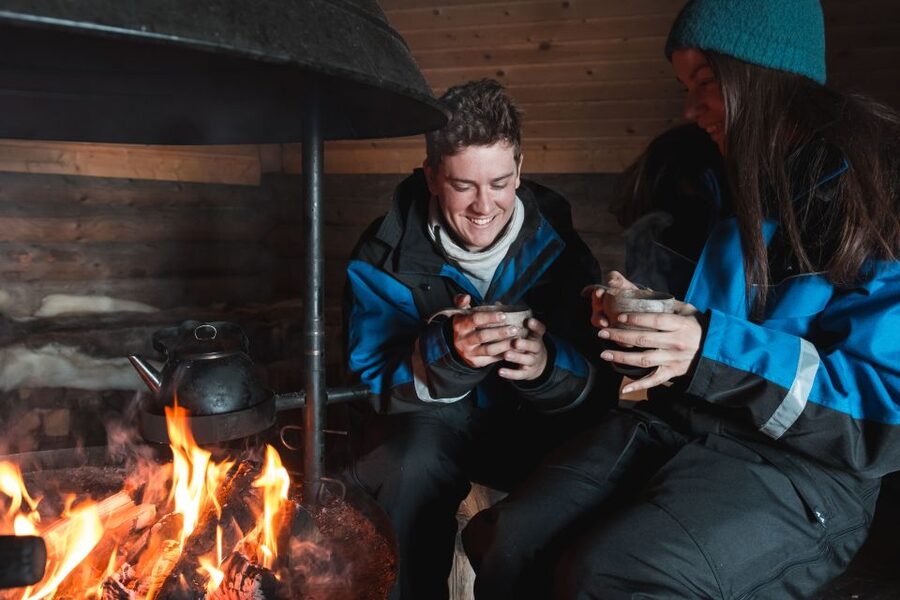 Ylläs: Snowmobile Adventure with Ice Fishing - Arriving at the frozen lake and learning to fish